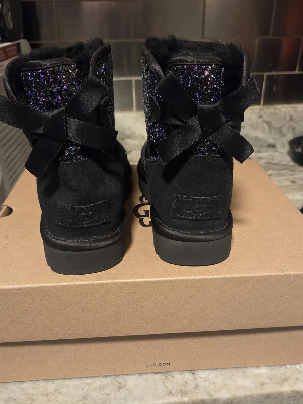 UGG Kids Glitter Boot in Black with Purple Sparkle